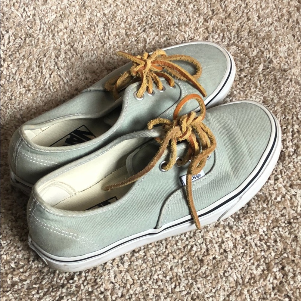 Green van sneakers with leather laces